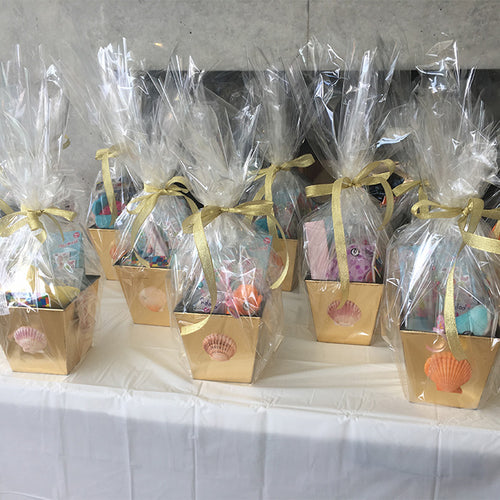 Themed gift boxes on a table