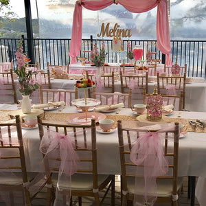 kids pink themed high tea party set with with a pink dessert table