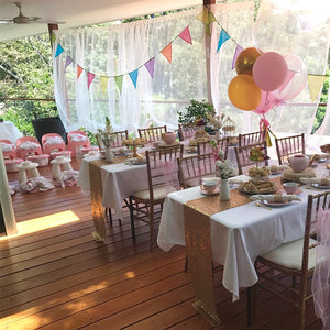 themd kids high tea and pamper party set up combined on a decked balcony
