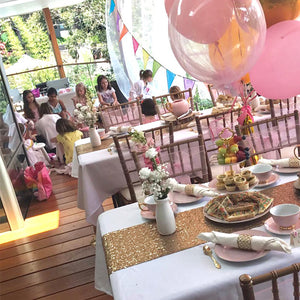 a kids high tea set up with balloons and a pamper pamper party set up at a Sydney location