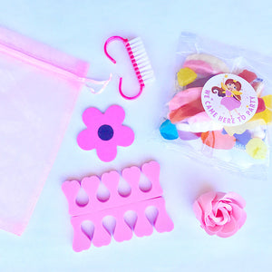 kids party gift bag with pink gift items 