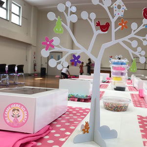 kids cupcake decorating party set up at a hall party venue