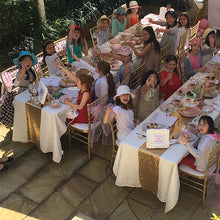 girls playing themed party games at a high tea party