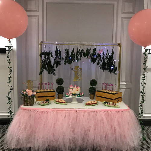 fairy themed party dessert table with cake