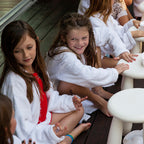children having fun and receiving manicures at an ultimate pamper party by We Came Here To Party