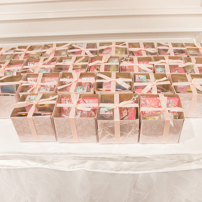 Fairy gift favour boxes on a table 