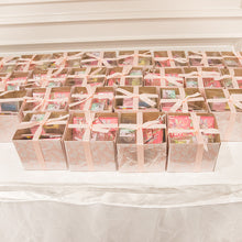 Fairy gift favour boxes on a table 