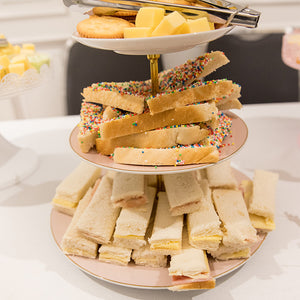 Kids high tea food on a tiered stand for a high tea party