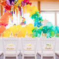 kids tiffany chair hire being used in a unicorn theme party set up