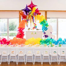 unicorn theme party with kids white tiffany chairs 