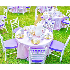 Unicorn Party with Gold table setting and white with purple tiffany chairs