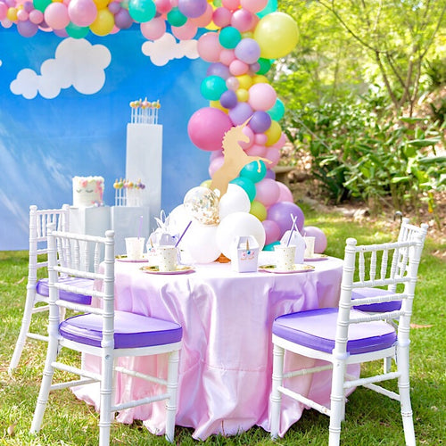 Unicorn party with cloud balloon decorations and unicorn decorations